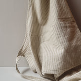 Forkle i bomull - beige med gule striper